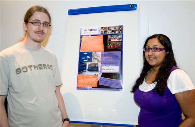 Olly and I presenting the poster (image credit: Michael Cockerham)